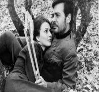 Promotional poster for the Bulgarian drama “The Peach Thief” (1964), featuring the main cast standing near barbed wire, representing love and separation during World War I.